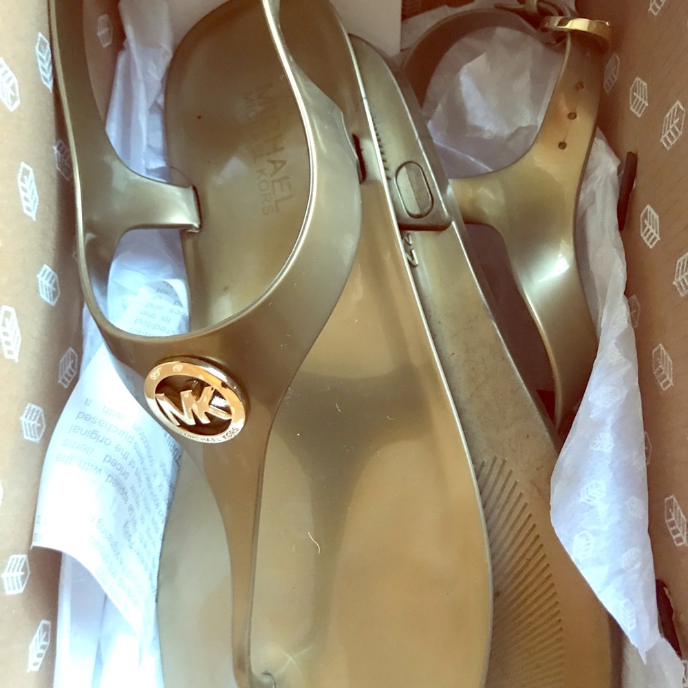 Michael Korz sandals. Rubber with gold hardware